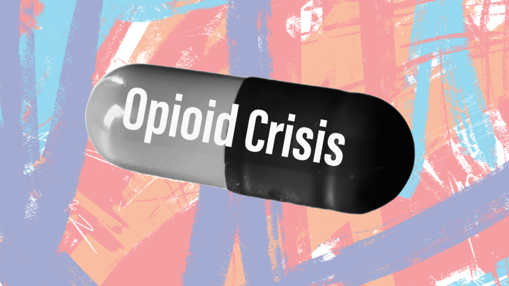 A closeup of a pill capsule that says "Opioid Crisis"